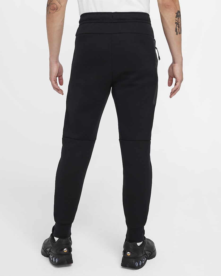 Nike taped joggers black online